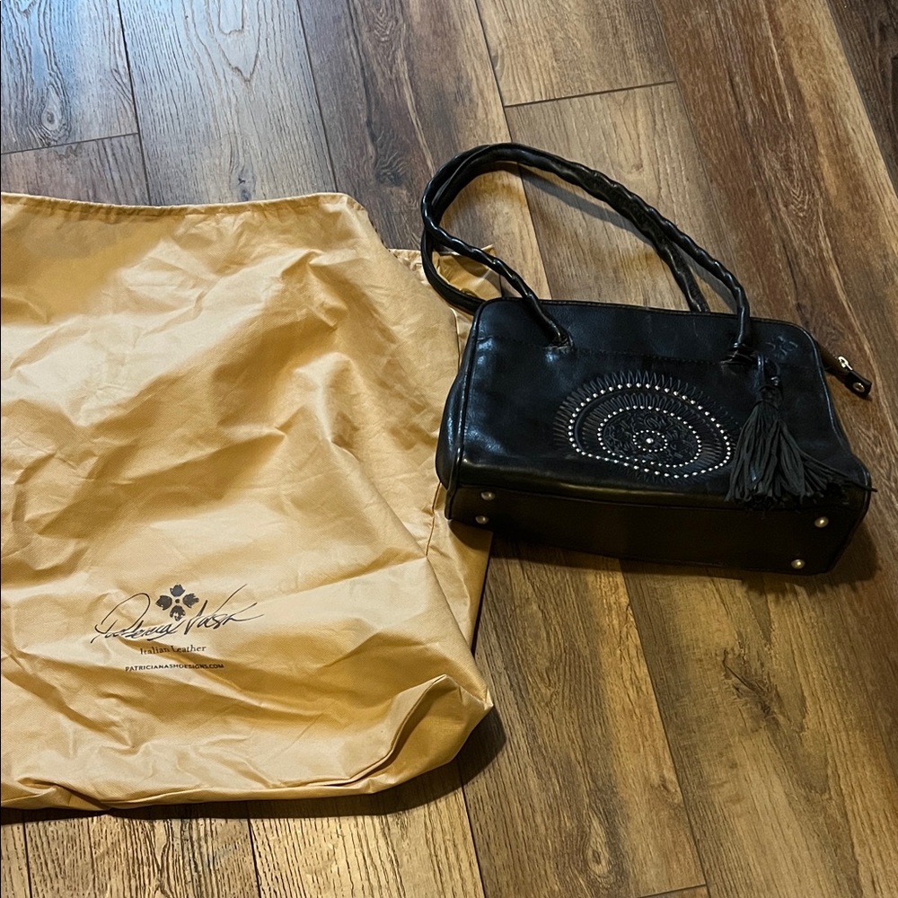 Patricia Nash Black Leather purse with Tassels comes w bag